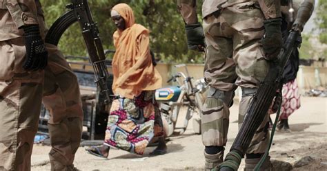 jc spankbang|Female suicide bombers kill at least 18 in Nigeria .